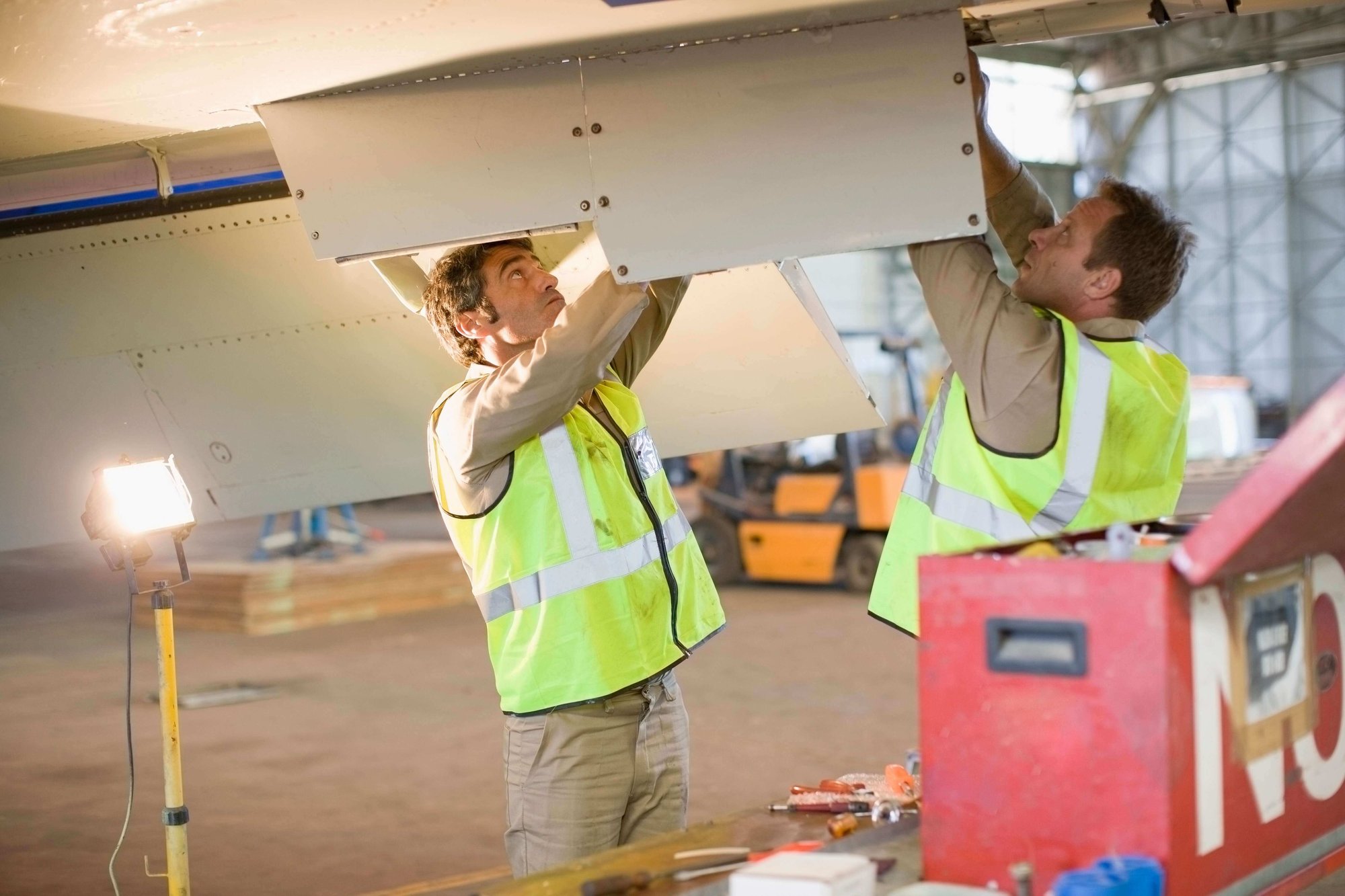 aircraft-workers-checking-airplane-2021-11-17-21-34-32-utc